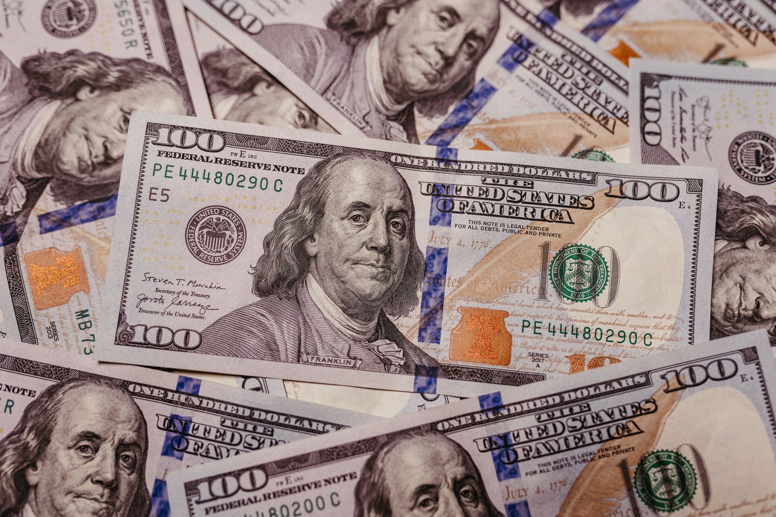 Stack of hundred dollar bills