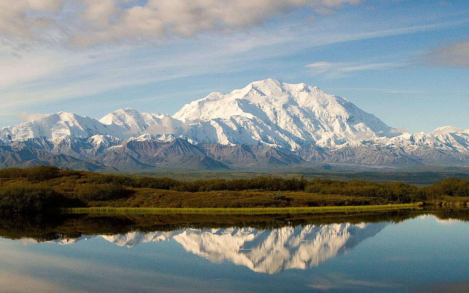 Snow-covered Denali reflected in Wonder Lake at Denali National Park, Alaska