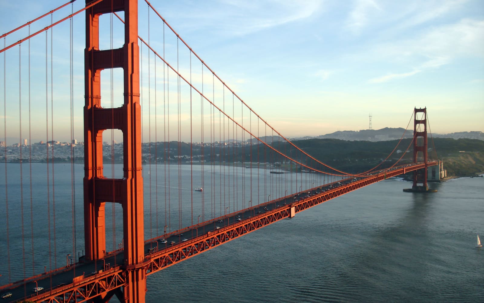 Golden Gate Bridge spanning San Francisco Bay at sunset, seen from the Marin Headlands