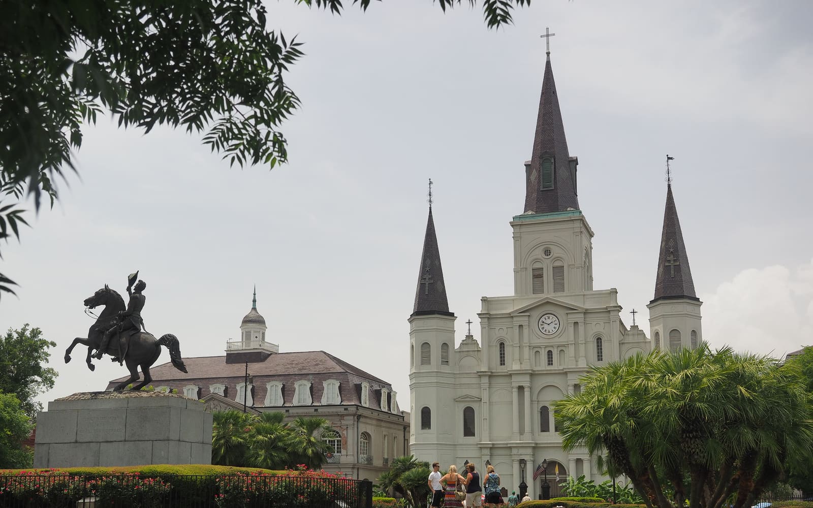 St. Louis Cathedral and the Andrew Jackson statue seen across the gardens of Jackson Square in the French Quarter, New Orleans