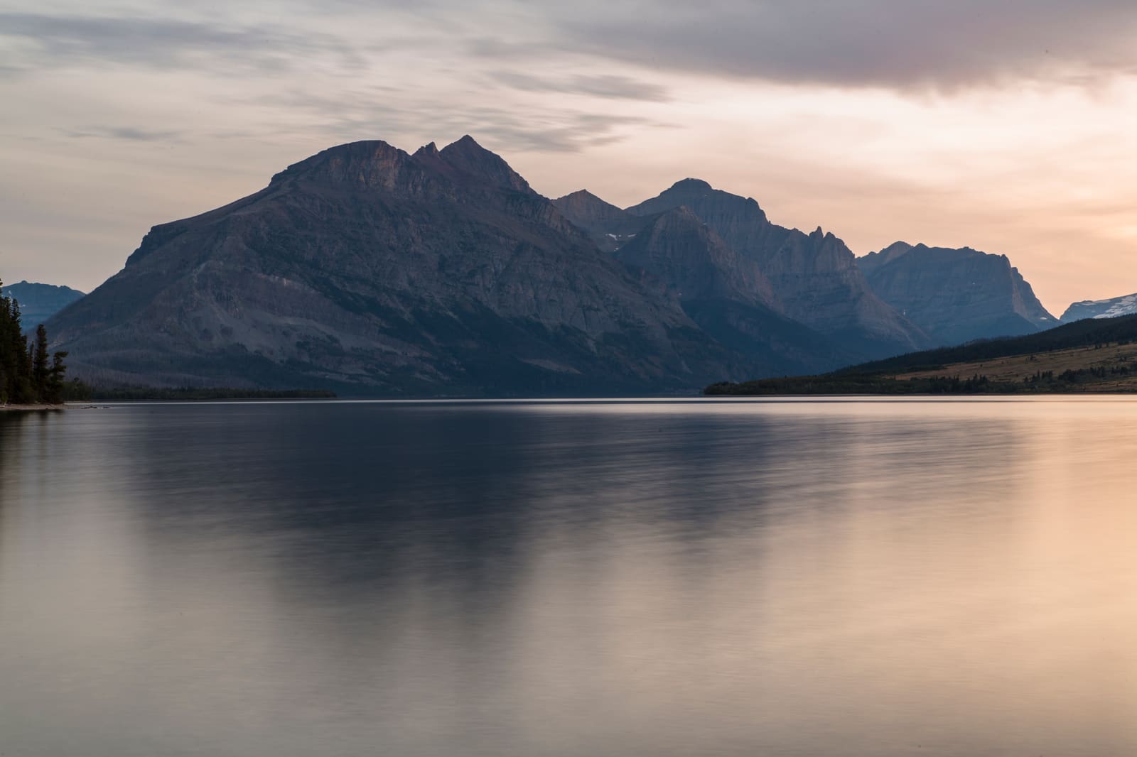 Sunset over Saint Mary Lake and the peaks of Glacier National Park, Montana