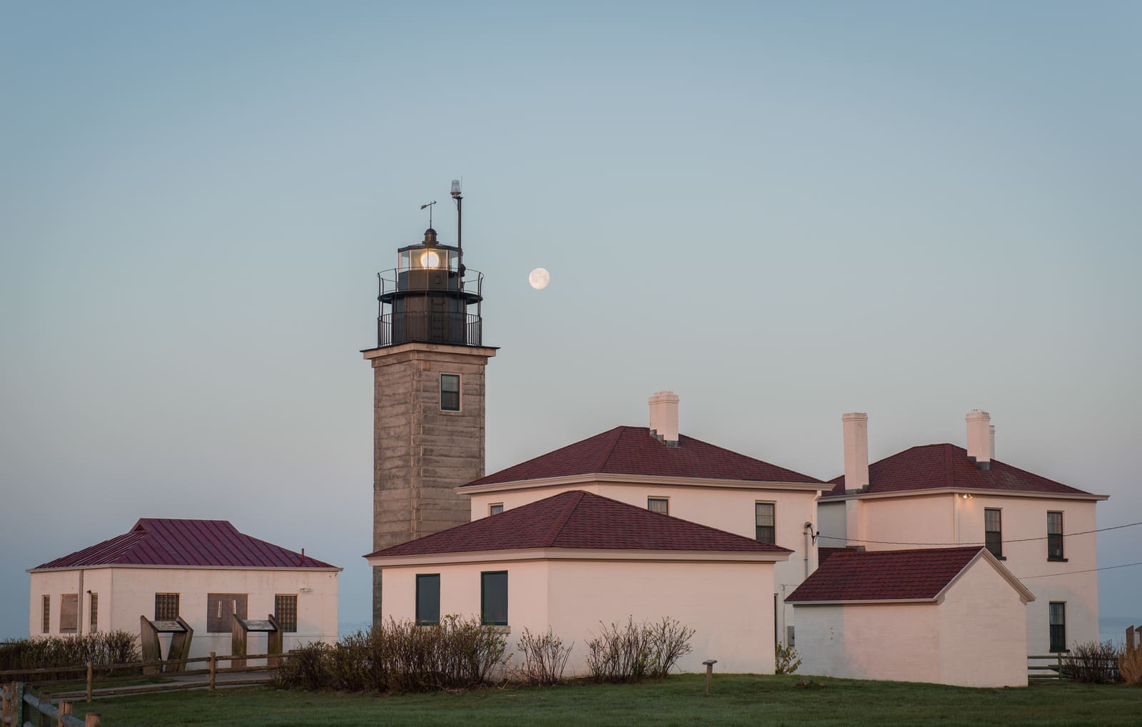 Beavertail Lighthouse at dawn with the moon over Narragansett Bay, Jamestown, Rhode Island